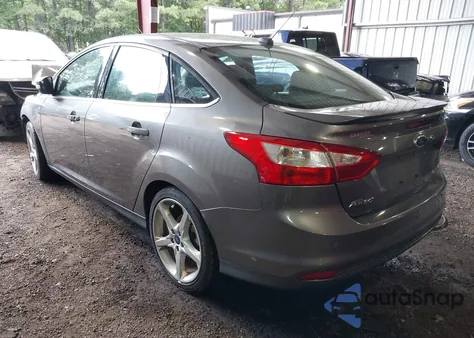 2014 Ford Focus Titanium from USA, damaged, VIN 1FADP3J28EL317034